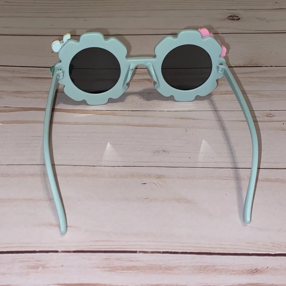 Girls greyish sunglasses w charms